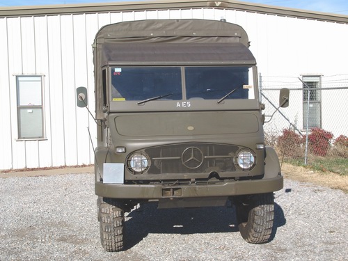 Swiss Army Service Unimog. With softtop covering
s ..
