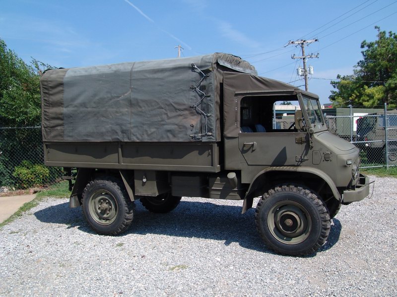 Swiss Army Service Unimog. With softtop covering
s ..