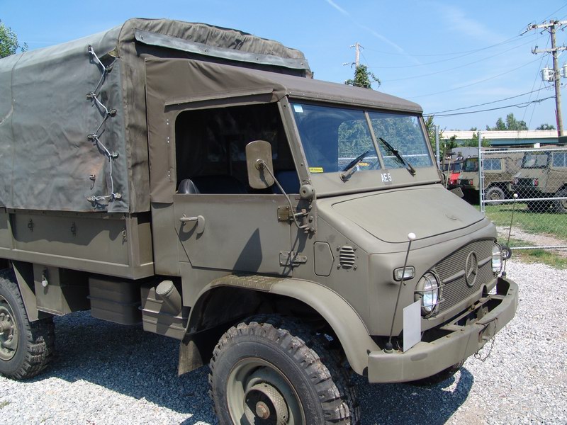 Swiss Army Service Unimog. With softtop covering
s ..