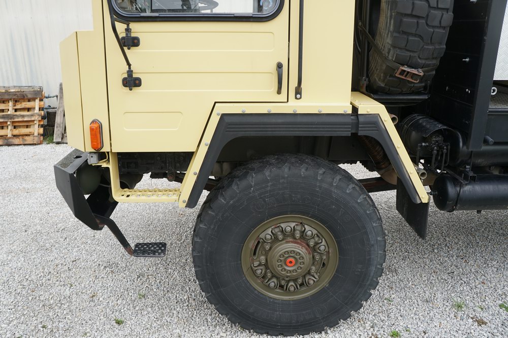 Former Swiss Army Troop Carrier Converted to a Exp ..