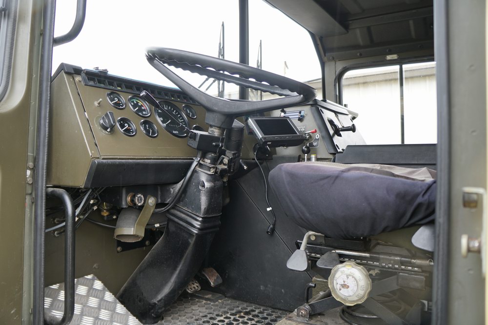 Former Swiss Army Troop Carrier Converted to a Exp ..