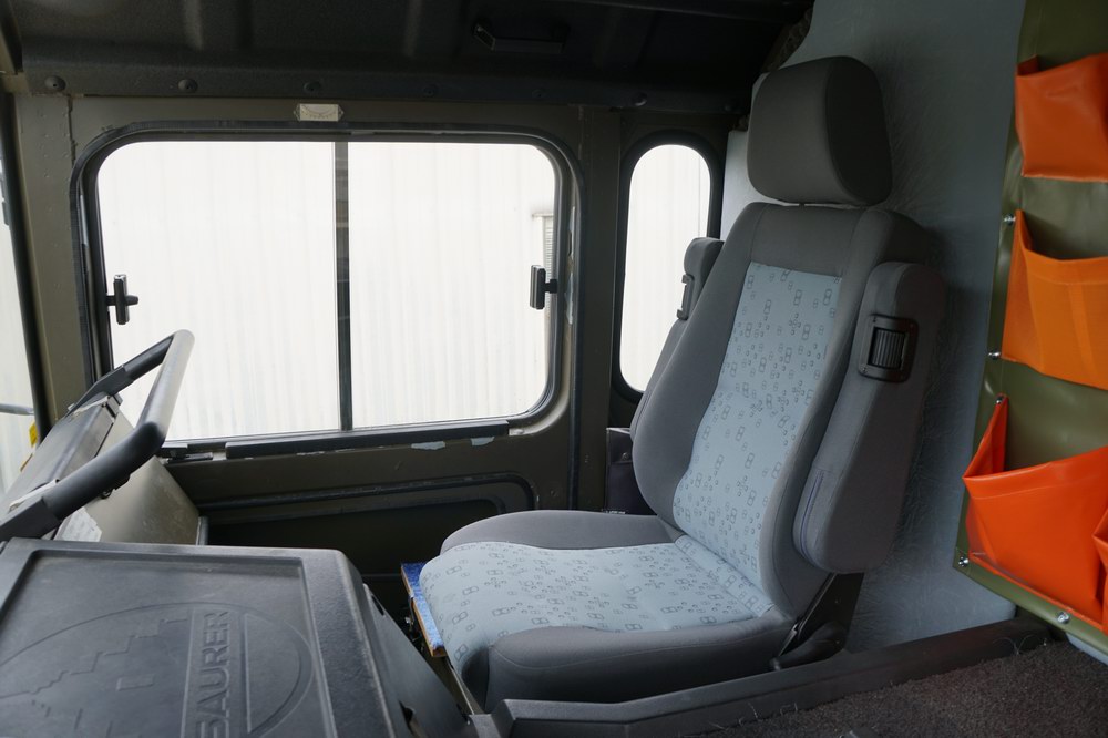 Former Swiss Army Troop Carrier Converted to a Exp ..