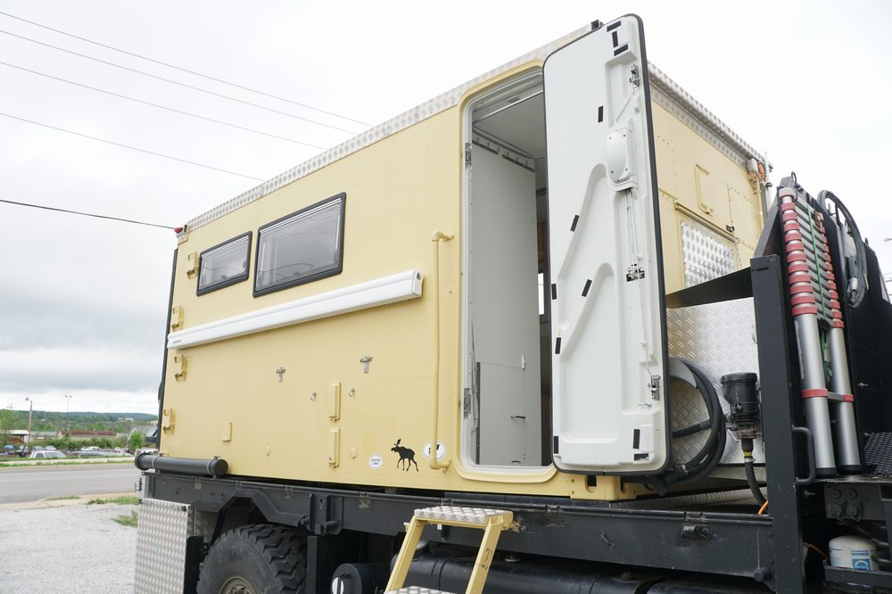 Former Swiss Army Troop Carrier Converted to a Exp ..