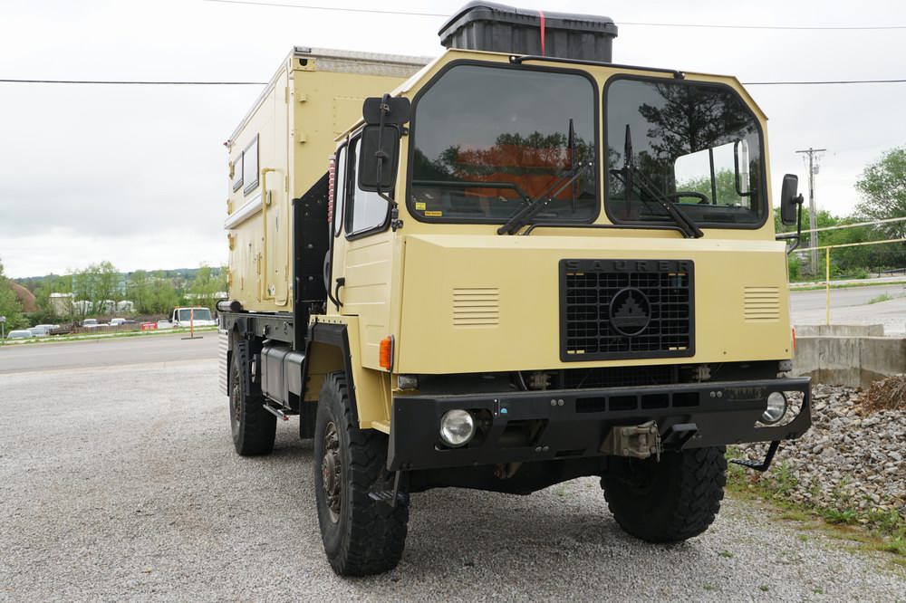 Former Swiss Army Troop Carrier Converted to a Exp ..