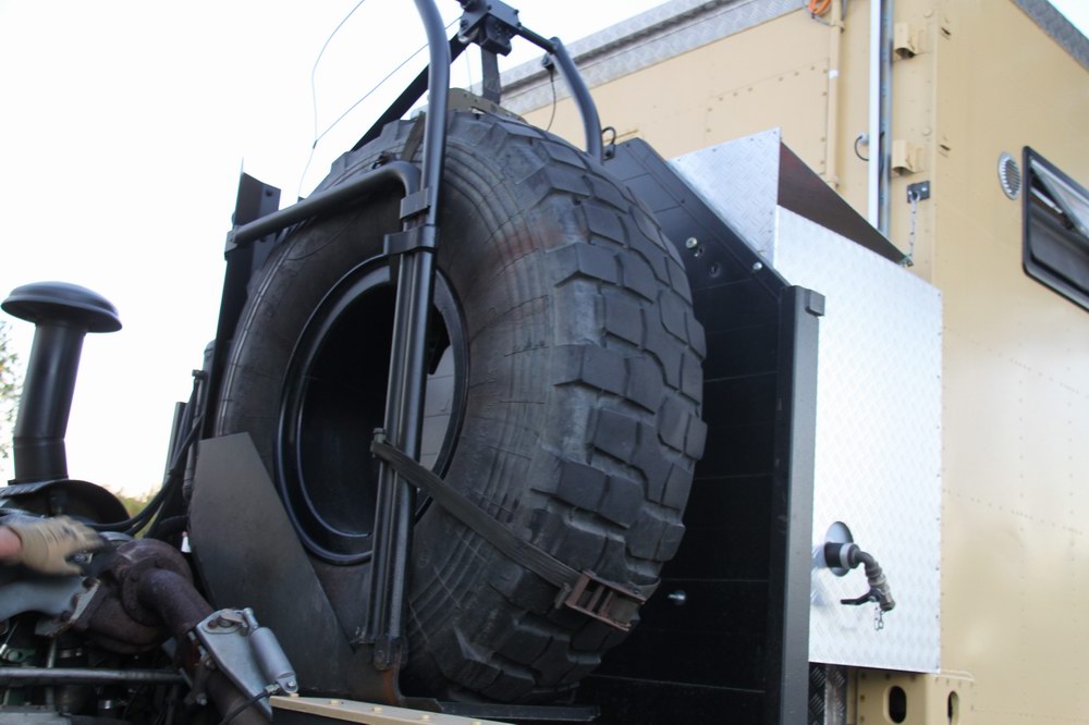 Former Swiss Army Troop Carrier Converted to a Exp ..