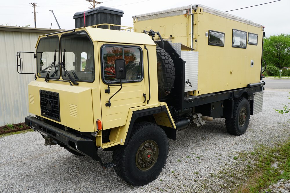 Former Swiss Army Troop Carrier Converted to a Exp ..